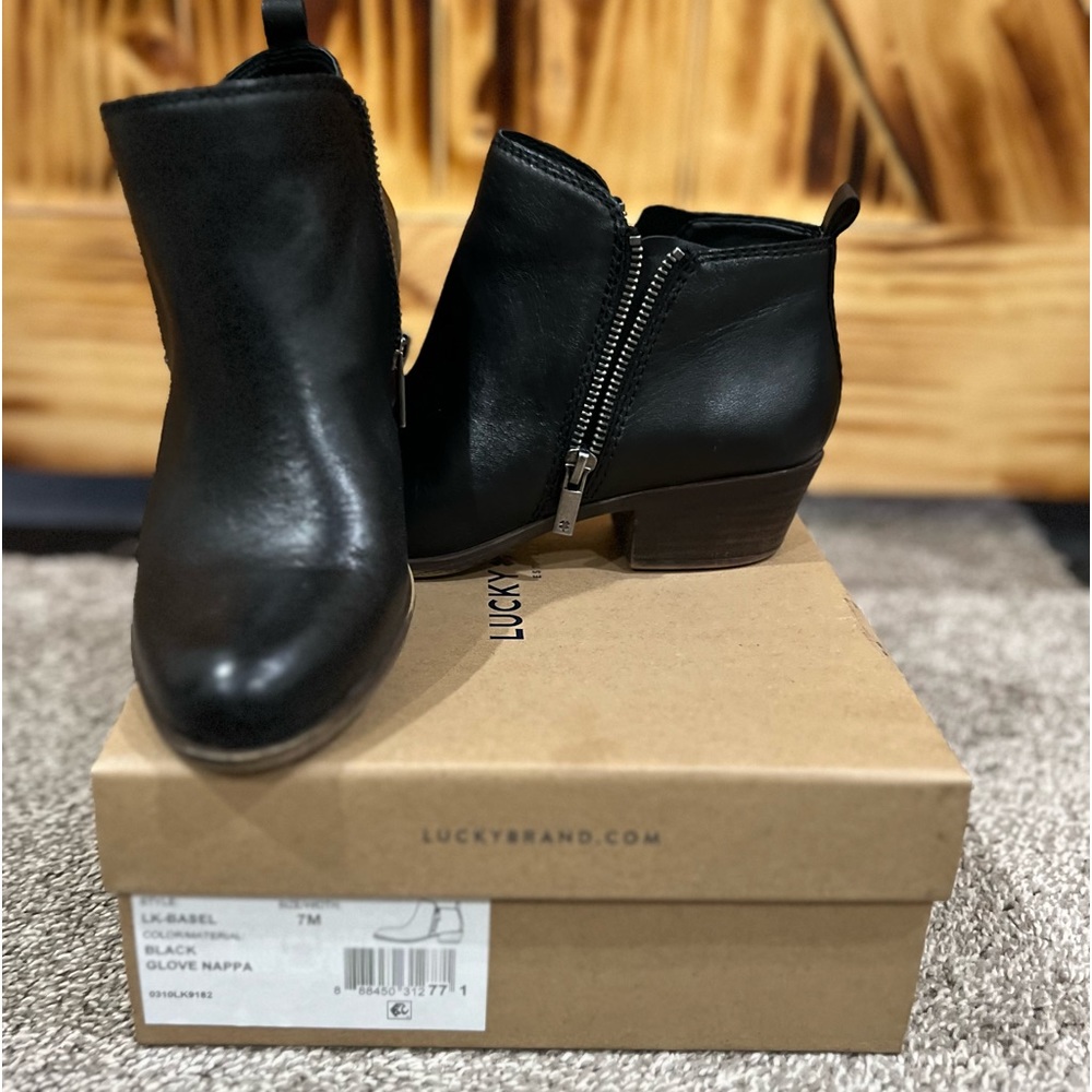 Lucky brand black leather double zip booties.
